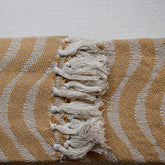 Frazada Masai mostaza claro 125x150 cm 100% algodón con diseño artesanal